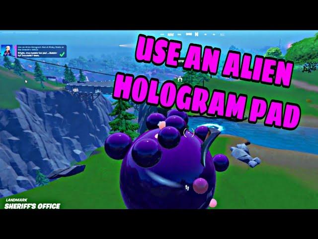 Use an Alien Hologram Pad at Risky Reels or the Sheriff's Office