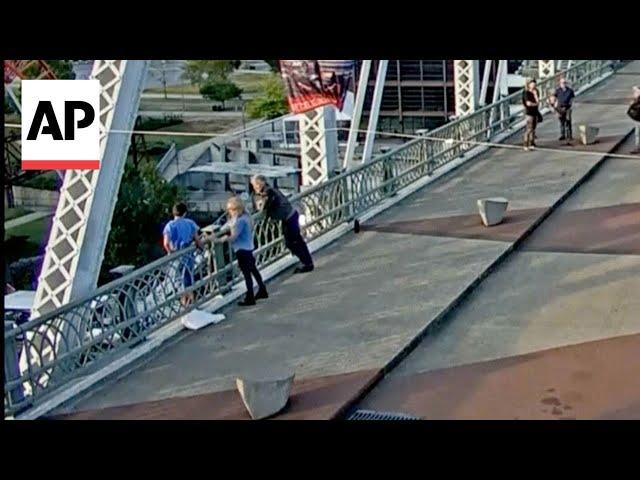 Jon Bon Jovi helps talk a woman down from the ledge on Nashville bridge