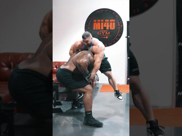 Bodybuilder Wrestling a Powerlifter throwback