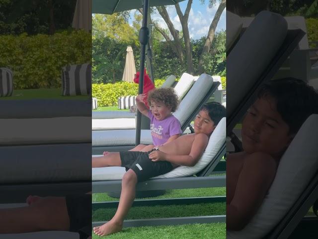 Mom catches daughter and son relaxing by the pool *cute* #shorts