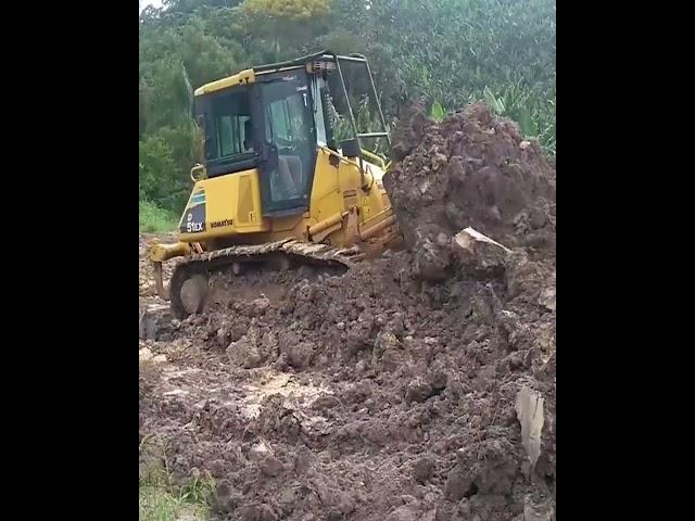 Komatsu D51EX Bulldozer Action Managing Land