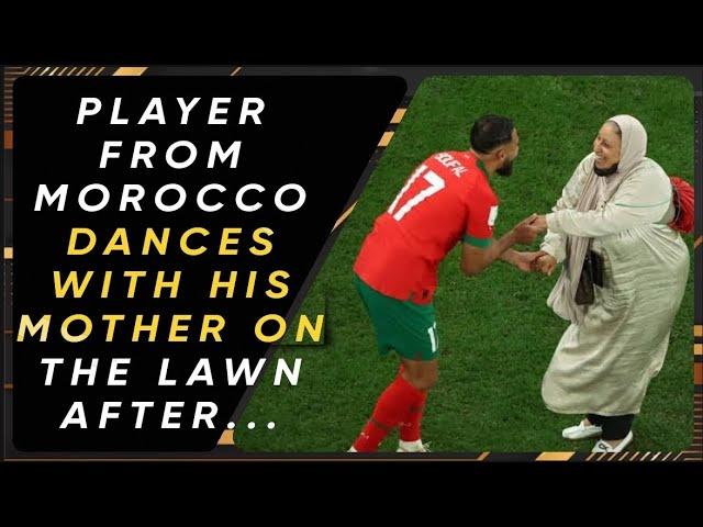 PLAYER FROM MOROCCO DANCES WITH HIS MOTHER ON THE LAWN AFTER CLASSIFICATION.