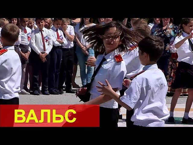 Russia. Young Cossacks dance a waltz