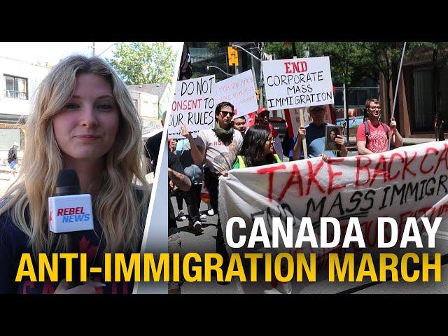 ‘Take Back Canada!’: Anti-mass immigration protesters march in Toronto on Canada Day