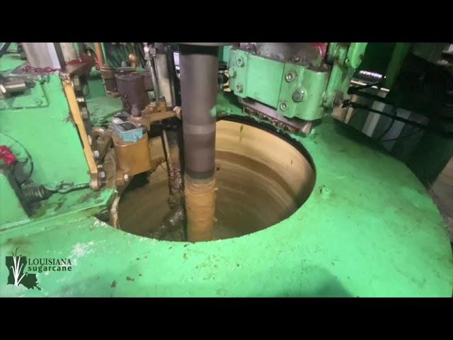 Sugar centrifugals separate sugar from molasses in Louisiana sugar mill