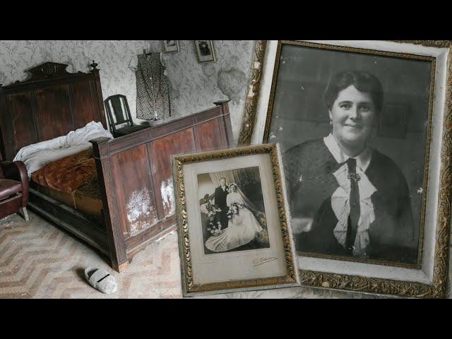 Abandoned house with portraits