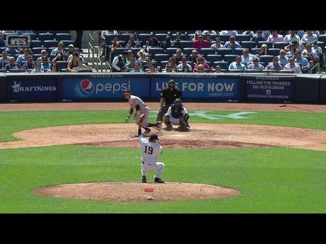 BAL@NYY: Tanaka protects his face by snaring a liner