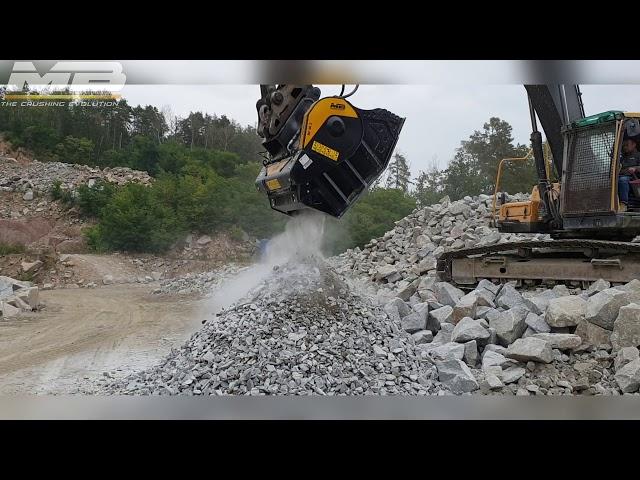 Crushing granite down to size 6cm with the MB Crusher Bucket