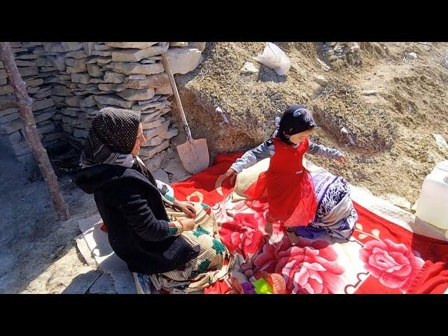 heating the cave hut and bathing Zari and her daughter in it and washing clothes