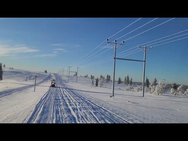 Driving Snowmobile in Finland