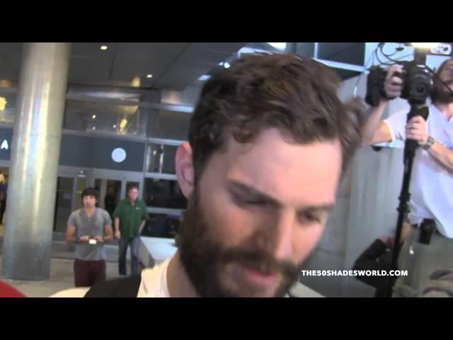 January 6th, 2015 - JAMIE DORNAN arrives at LAX Airport in Los Angeles #1