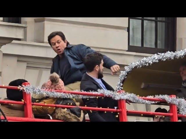 mark walhburg filming a fight scene with kit Harrington on top of red bus in #london