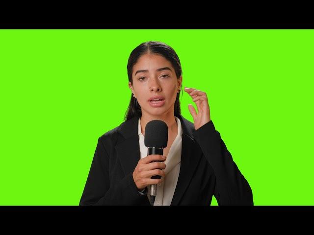 Female-reporter-reporting-with-microphone [Copyright Free Green Screen]