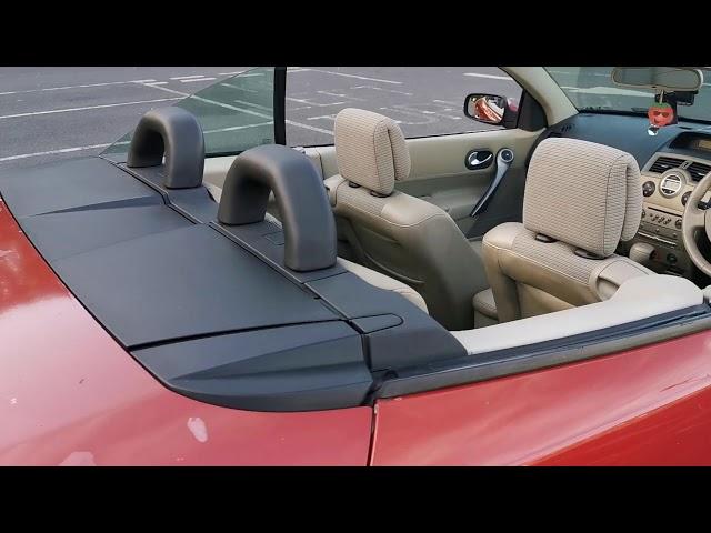 How to open the roof on a convertible car (Renault Megane)