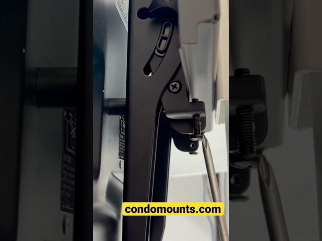 How to Remove safety screw to unlock tv from stuck position? Condomounts #tvmount #wallmount