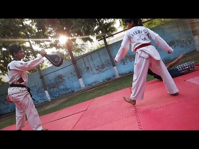 Taekwondo slap and 360 kick