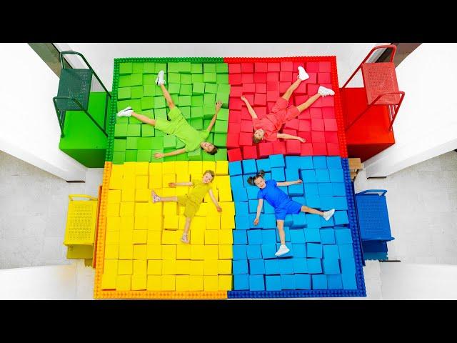 Vania Mania Kids Jumping Through impossible Shapes into Colored Foam Pit!