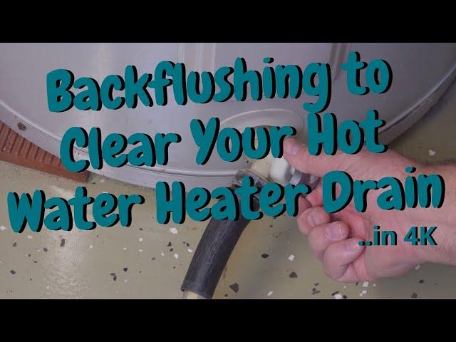 Back-flushing a clogged drain on a hot water heater