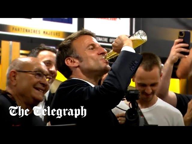 Emmanuel Macron downs a beer with French rugby champions Toulouse