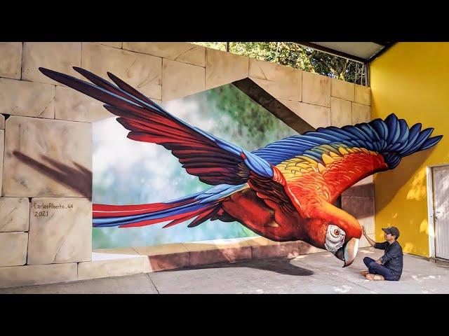 Street Artist Paints a Jaw-Dropping 3D Wall Mural of a Parrot || WooGlobe