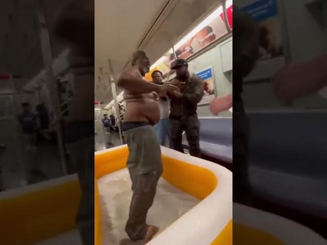 Homeless Man Takes A Shower On NYC Train