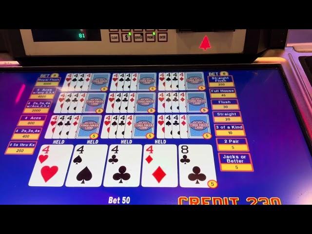 Dealt 4 fours. Triple double bonus video poker. Very happy with number of kickers.  Buffalo Creek.