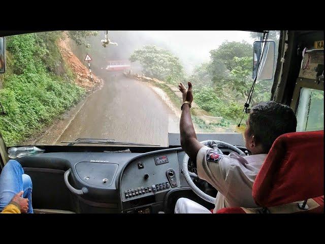 Multi axile Bus meets another Bus in a Tight Ghat section Turn