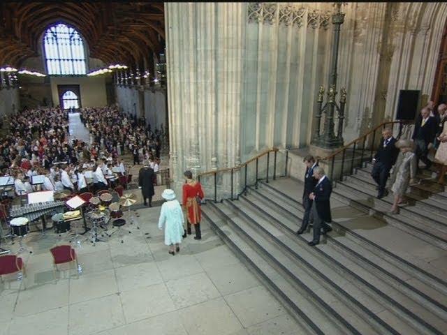 Royal trumpet fanfare as the Queen and her family arrive at Westminster Hall for lunch