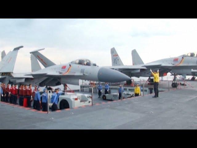 Chinese aircraft carrier Liaoning conducts landing practice