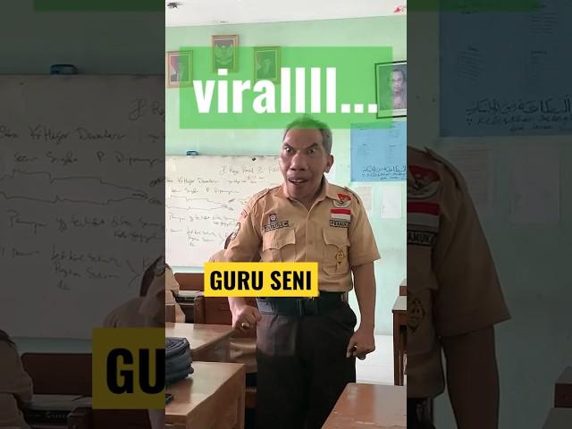 #viral guru seni pakai baju pramuka