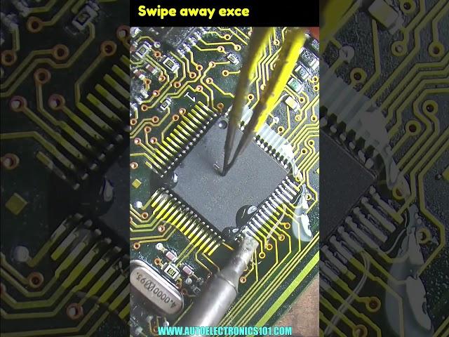 Drag soldering technique for 64 leg smd chip #soldering  #electronicsrepair #short