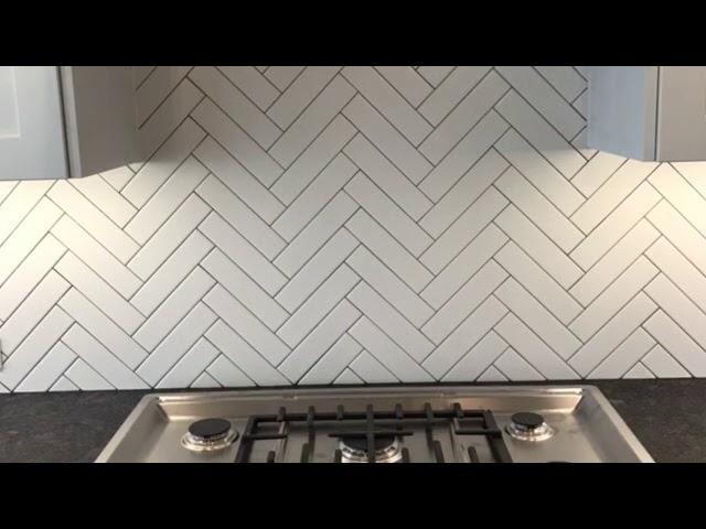 Herringbone Backsplash Completed #herringbonepattern #herringbonetile #herringbone #tiletrends