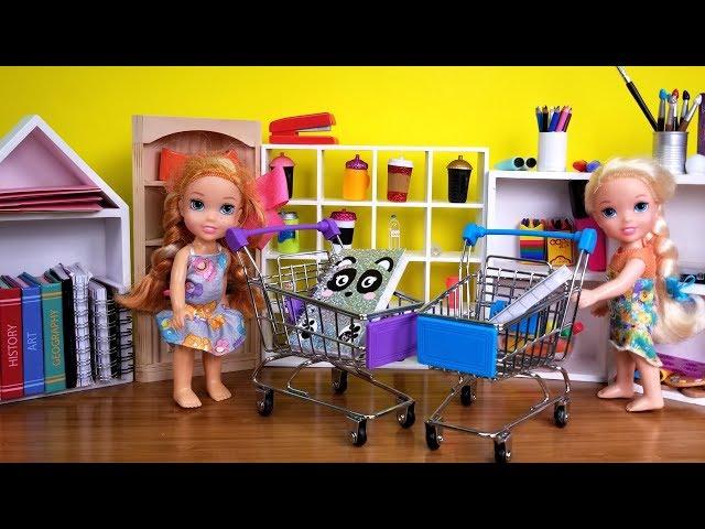 Elsa and Anna toddlers buy school supplies from store - Barbie is seller