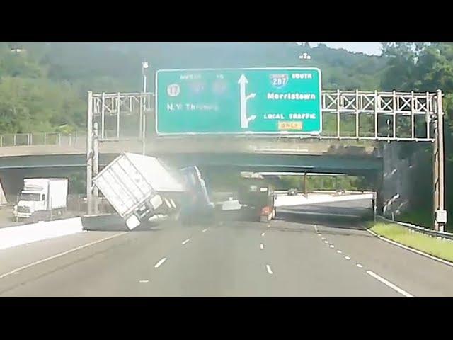 Video shows tractor-trailer overturn in alleged road rage crash