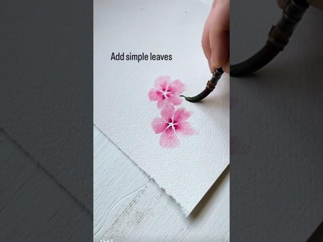 If you’re stuck with watercolor flowers, try this easy way to paint perfect little petals every time