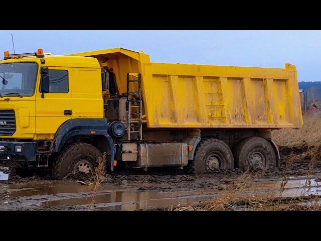 Cargo transportation through mud off road!  Heavy equipment works off road!