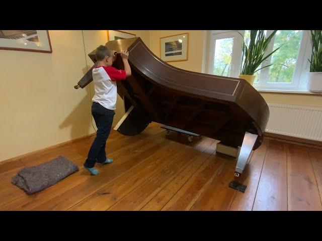 A concert grand piano can be tilted up and down from the trolley with just one person -child's play!