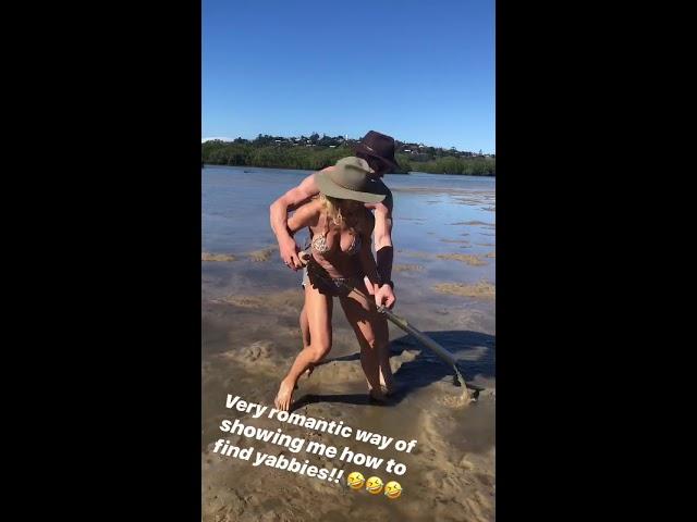 Chris Hemsworth and Elsa Pataky riding each others while finding yabbies