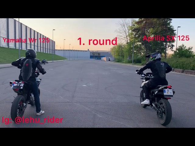 Aprilia sx 125 vs. Yamaha wr 125 acceleration/ drag race battle sound