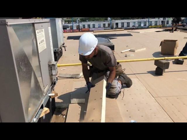 Installing Poly Iso Insulation and Sopraboard -- Soprema Commercial Roofing