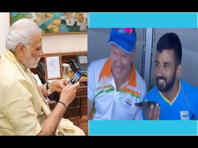 PM Narendra Modi speaks to the Hockey team Captain Manpreet Singh, coach Graham Reid - worldnews24