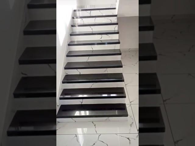 R black granite staircase with porcelain white tile riser | beautiful staircase #mydreamhouse