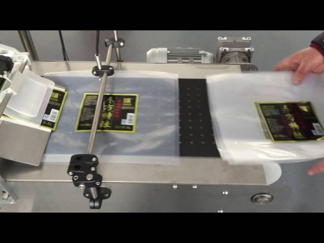 fully automatic plastic bag pouch labeling machine(pneumatic type bag separating)