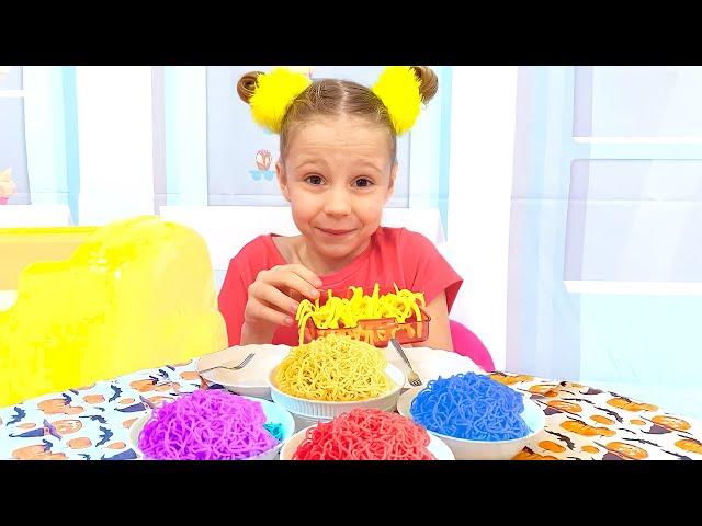 Nastya and dad are preparing colored noodles