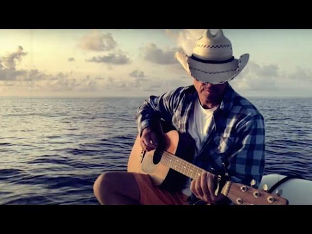 Kenny Chesney - Beautiful World (Official Music Video)