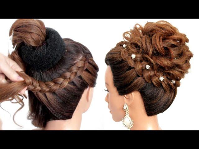 Bridal hairstyle for long hair. High bun.