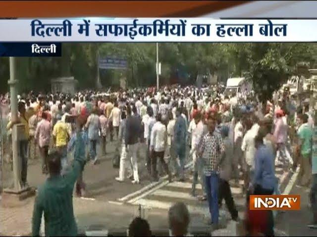 Delhi Municipal Corporation sanitation workers hold protest near Delhi CM residence