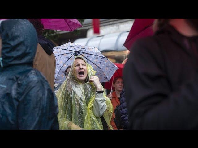 Protesters surround Serbia's state TV station, accusing it of pro-government bias