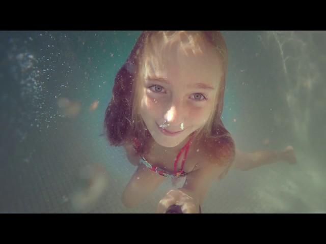 Carla Underwater - swimming underwater and blowing bubbles