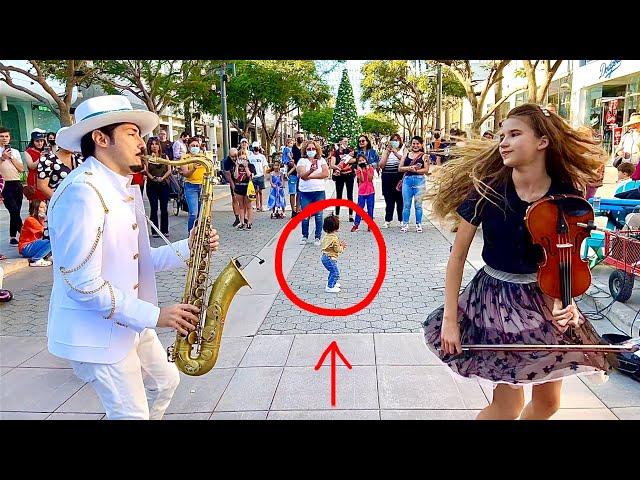 1-year-old baby JOINS "Dance Monkey" | STREET PERFORMANCE - Karolina Protsenko & Daniele Vitale SAX